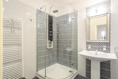 a bathroom with a shower and a sink at Academia in Prague