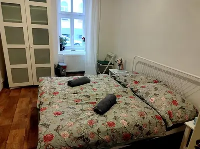 a bed with two pillows on it in a bedroom at Nice one bedroom apartment in zizkov in Prague