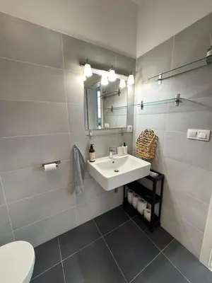 a kitchen counter with a coffee maker and a toaster at Terrace Apartman Víšek in Prague