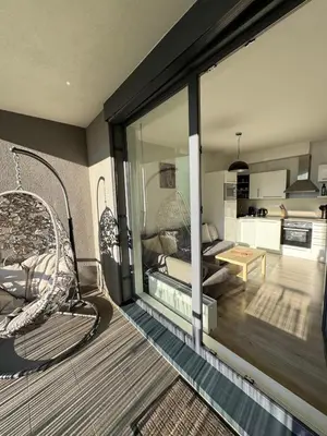 a living room with a couch and a table at Terrace Apartman Víšek in Prague