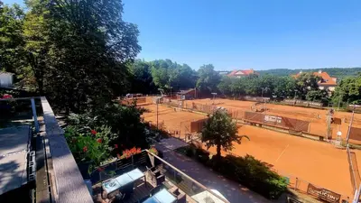 an aerial view of two tennis courts at Tenis Cibulka Suites in Prague