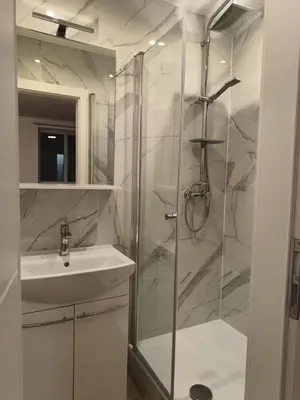 a bathroom with a shower and a sink at Apartment in the Center of OId Town in Prague