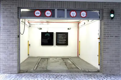a door to a building with signs on it at KIP Old Town Modern Apartment with Free Parking & AC in Prague