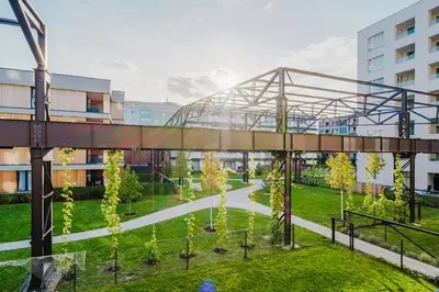an overhead view of a park with trees and a bridge at Blueground Prague 7 furnished close to offices PRG-22 in Prague
