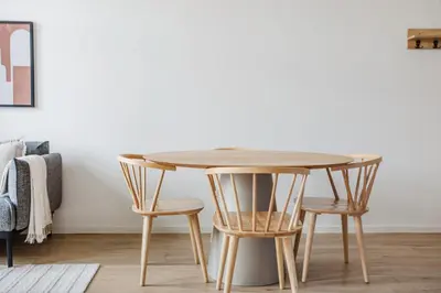 a wooden table and chairs in a room at Blueground Prague 2 renovated Náměstí Míru PRG-33 in Prague