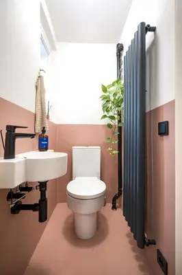 a bathroom with a toilet and a sink at Prague Days - One-bedroom Apartment with Balcony and Workspace in Vinohrady in Prague