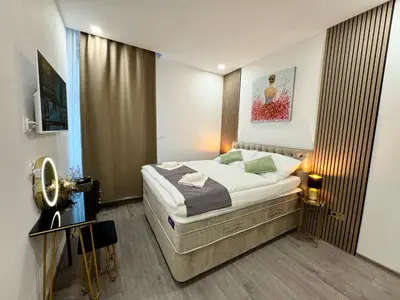 a bedroom with a bed in a room at Little Downtown Apartment in Prague