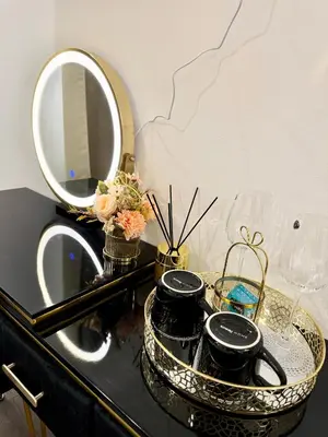 a bathroom vanity with a mirror and a sink at Little Downtown Apartment in Prague