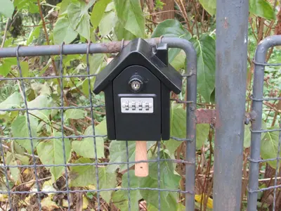 a parking meter attached to a fence at PragueCityApartment in Prague