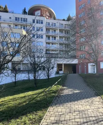 a brick walkway in front of a building at Praha 5 Barrandov- Apartmán Daniela in Prague