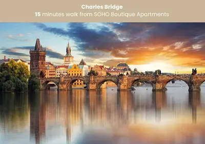 a bridge over a river with a city in the background at Wenceslas sq SOHO Boutique Hotel & Premium Suites in Prague