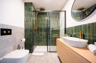 a bathroom with a shower and a toilet and a sink at Wenceslas sq SOHO Boutique Hotel & Premium Suites in Prague