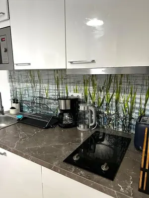 a kitchen with a counter top with a coffee maker at Quiet cozy apartment in the center in Prague