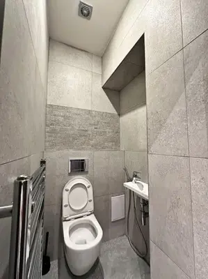 a small bathroom with a toilet and a sink at Château Étoile Loft - PRG Centre in Prague