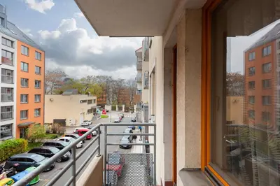 a balcony with a view of a parking lot at Bliss Apartment in Prague