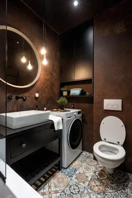 a bathroom with a toilet and a washing machine at Prague Days - Family-friendly Apartment with high speed Wi-Fi and Netflix in Prague