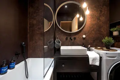 a bathroom with a sink and a mirror at Prague Days - Family-friendly Apartment with high speed Wi-Fi and Netflix in Prague