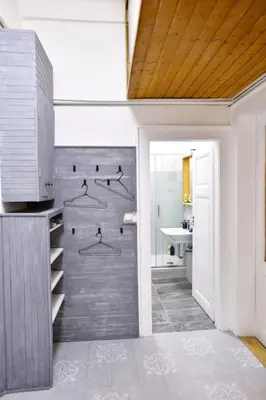 a kitchen with a stainless steel refrigerator and a sink at Airy & Bright Flat in Dejvice by Prague Castle in Prague