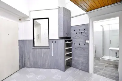 a bathroom with a sink and a mirror at Airy & Bright Flat in Dejvice by Prague Castle in Prague