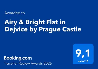 a bathroom with a toilet and a white door at Airy & Bright Flat in Dejvice by Prague Castle in Prague