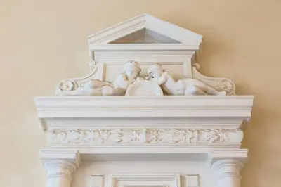 a white fireplace with a statue on top of it at Elegant Apartment in Wenceslas Square in Prague