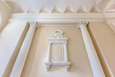 a pillar with a window in a building at Elegant Apartment in Wenceslas Square in Prague