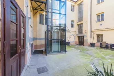 an entrance to a building with a glass door at Skyview Haven in Prague