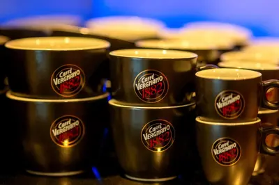 a group of coffee cups sitting on a table at Hotel NOBILIS - Mladá Boleslav in Bradlec