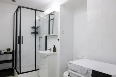 a bathroom with a shower and a toilet and a sink at Stay2gether - Grandma's Blues in Prague