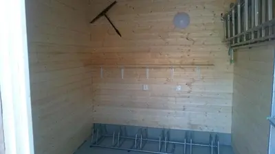 a corner of a room with wooden walls at Apartmány Vilekula Sázava in Sázava