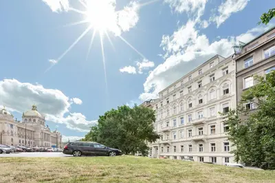 a car parked in front of a building at Anytime Holiday- Wenceslav Apartments in Prague
