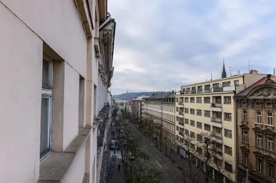 a view of a city street from a building at Modern & Stylish Apartments Ječná in Prague