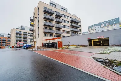 an empty street in front of a building at Blueground Chodov New build free parking PRG-41 in Prague