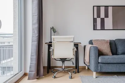 an office with a chair and a desk at Blueground Chodov New build free parking PRG-41 in Prague