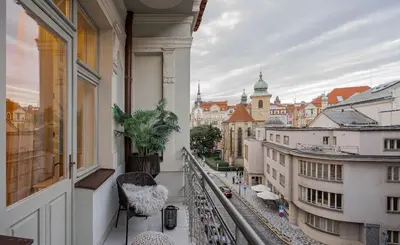 an apartment balcony with a view of a city at OLD TOWN LUXURY 3bd APARTMENT in Prague