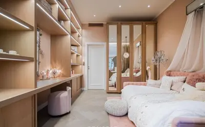 a bedroom with a large bed and a dressing room at OLD TOWN LUXURY 3bd APARTMENT in Prague