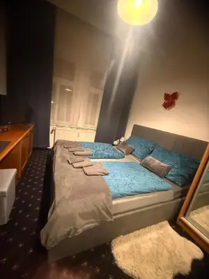 a bedroom with a bed with towels on it at Vysehrad studio near the Congress Centre, new bed in Prague
