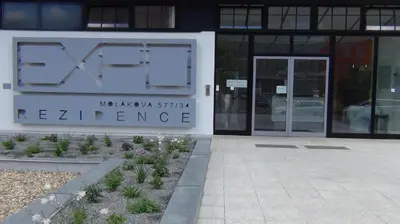 an entrance to a building with a sign on it at Best Residence Expo in Prague