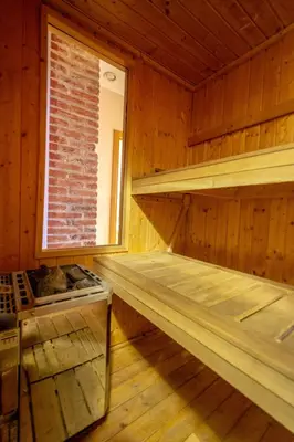 a room with two bunk beds in a cabin at Olives Ruterra Loft with Sauna in Prague