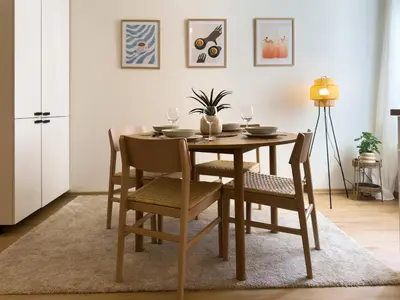 a dining room table and chairs in a room at 100m2 Wenceslas Comfort, 3BDR with Netflix in Prague