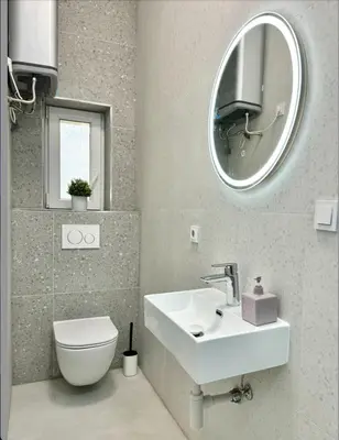 a bathroom with a sink and a toilet and a mirror at Cozy One-Room Apartment in heart of Prague in Prague