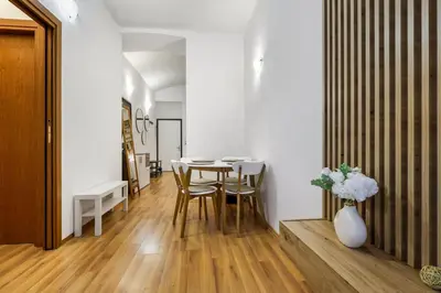 a dining room with a table and chairs at Cozy stay near City Center - Žižkov in Prague