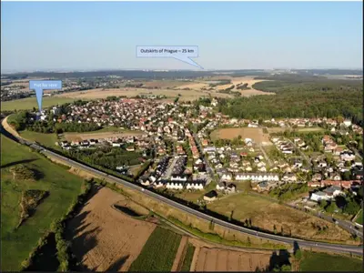 an aerial view of a city with a highway at Holiday Home in Kladno with Private Pool in Lány