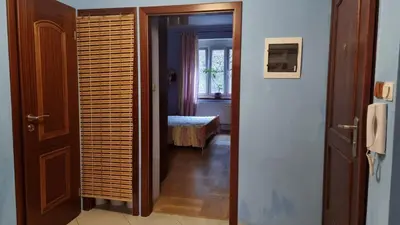 a hallway with a door leading to a room at Spacious two-room apartment in Prague in Prague