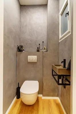 a bathroom with a toilet and a sink at Long Street Deluxe Suite Apartment Prague in Prague