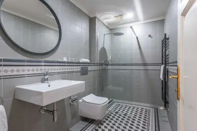 a bathroom with a sink and a mirror at St Wenceslas House in Prague
