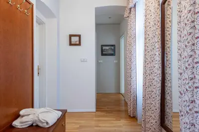 a room with a hallway with a mirror at St Wenceslas House in Prague