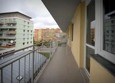 a balcony with a view of a street and buildings at Pleasant apartment close to city center in Prague