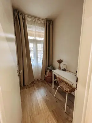 a room with a desk and a window at Stylish 1 bedroom plus office at amazing location in Prague