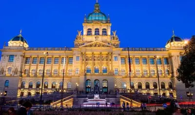 a large building with a fountain in front of it at Super central Prague apartment SUPERHOST 5 stars in Prague